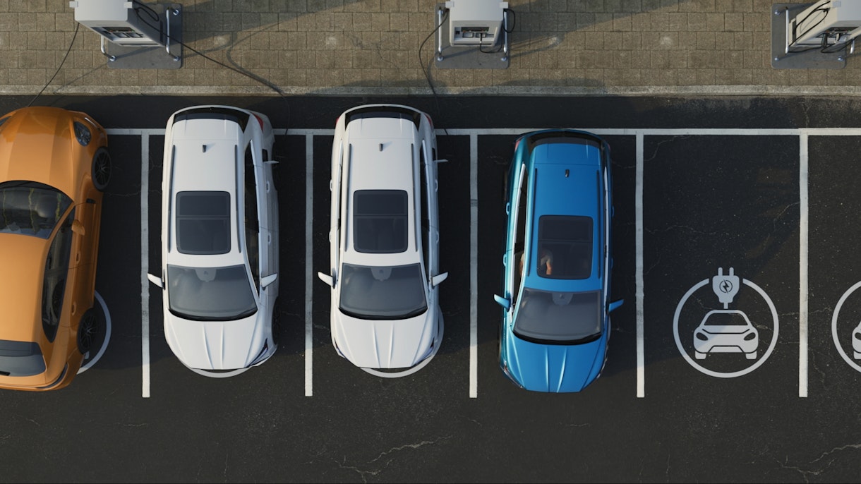 Electric cars charing in a parking lot