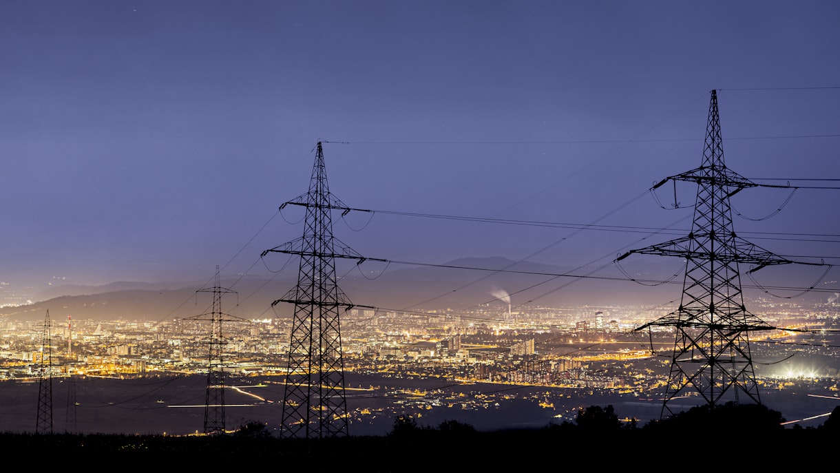Photo depicts an High power electricity poles in urban area.